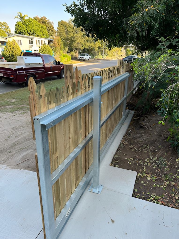 Grey Deck With A White Railing And A Tree in The Background — Ironbark Built Townsville in Mundingburra, QLD
