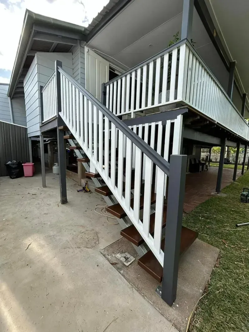 There are Stairs Leading Up to the Second Floor of a House — Ironbark Built Townsville in Mundingburra, QLD
