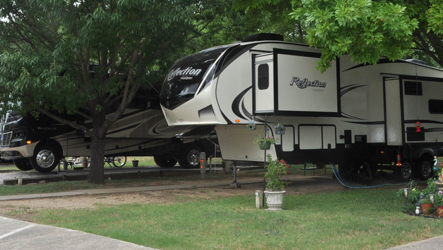 Fifth Wheel parked in back-in site