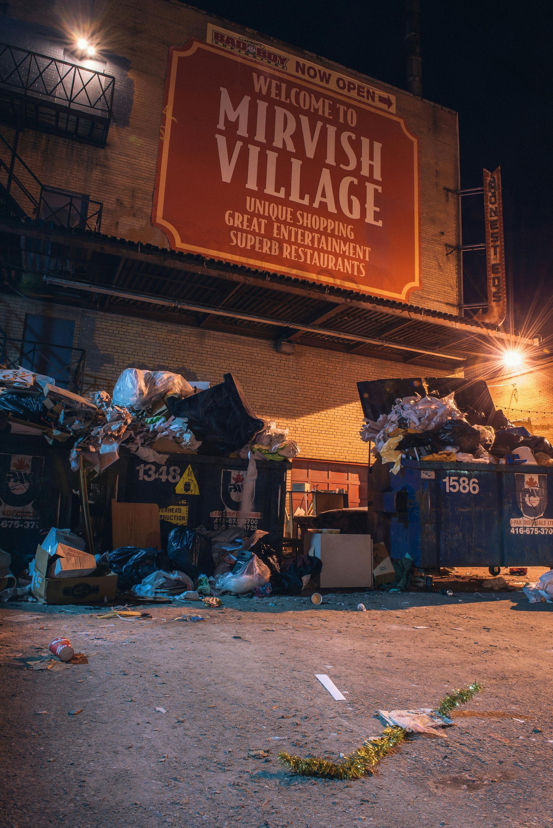 Trash piled high in front of a