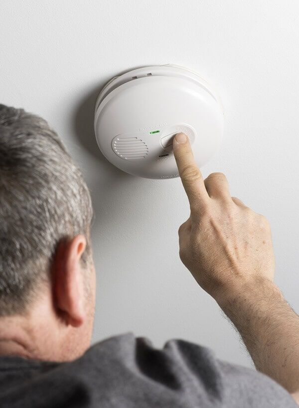 Checking Smoke Detector — Electrician in Noraville, NSW