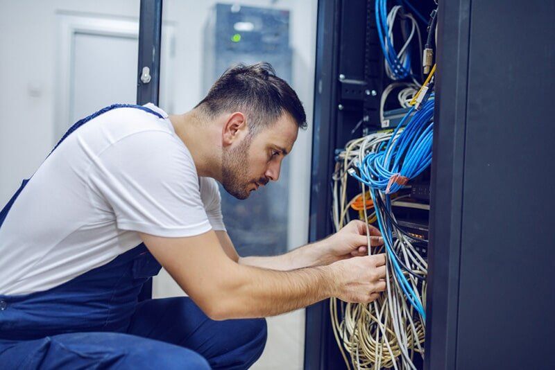 Checking Cables — Electrician in Noraville, NSW