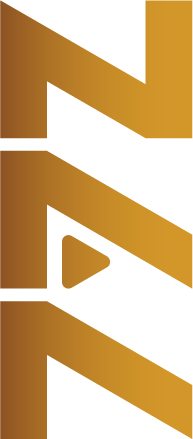 Three gold-colored stylized letters 