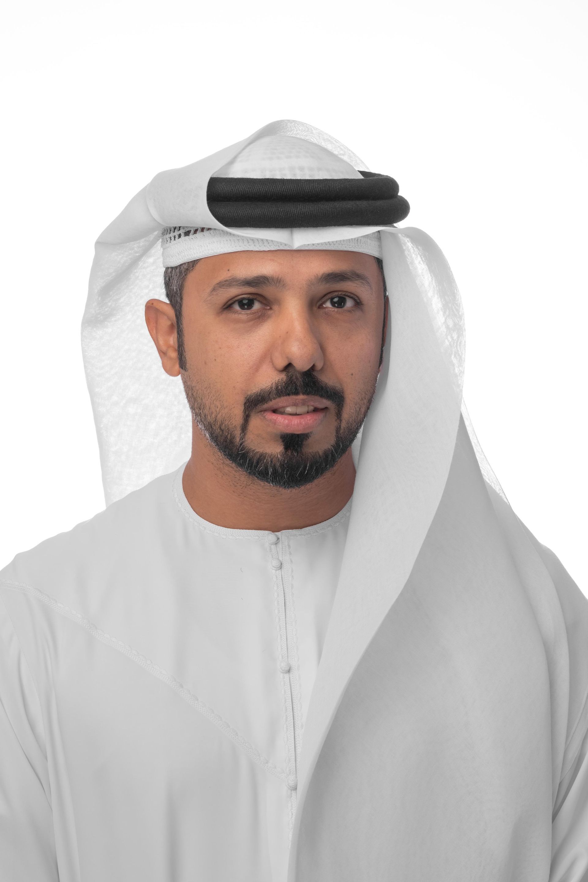 Man wearing traditional Arab clothing, looking directly at the viewer.