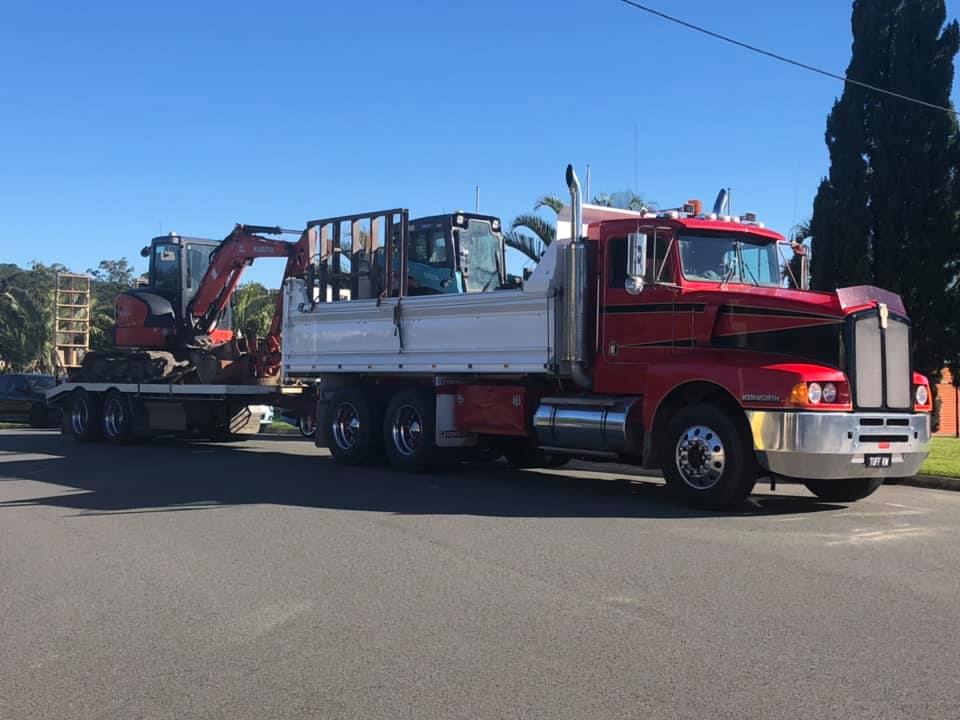 Big Truck Carrying Backhoe — Sunshine Coast, QLD — Bebrok Excavations
