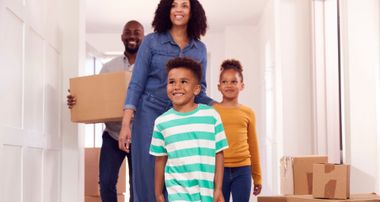 children-helping-parents-to-carry-boxes-into-new-h-2026-01-05-06-30-17-utc