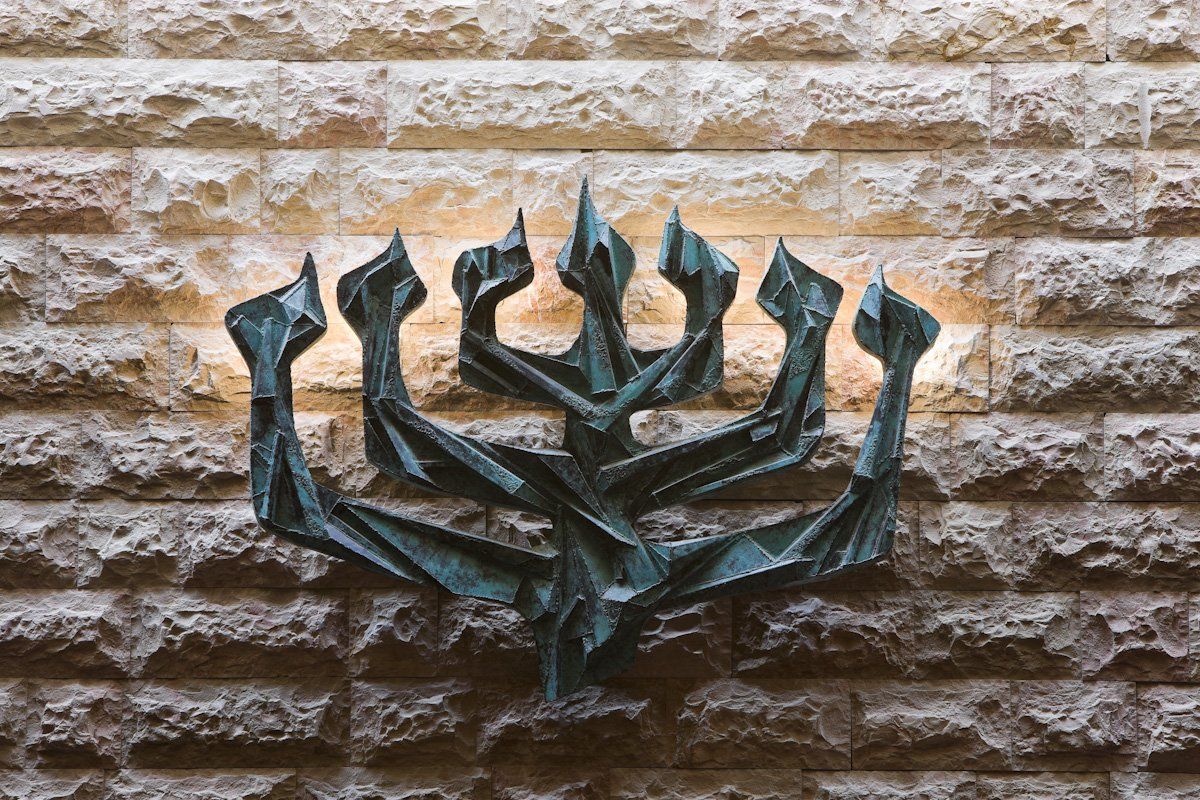 Backlit-Menorah-mounted-Jerusalem-stone
