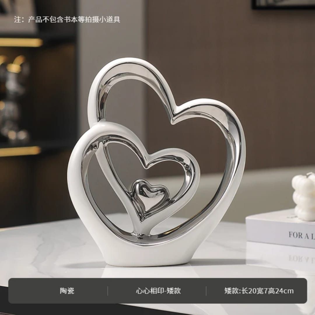 The Trinity of Love Nesting Hearts Sculpture