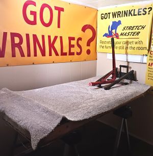 A room with a sign that says got wrinkles on it
