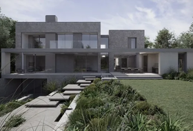 Modern gray two-story house with glass walls and a terraced garden leading to the entrance.