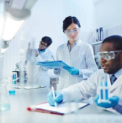 A group of scientists are working in a laboratory.