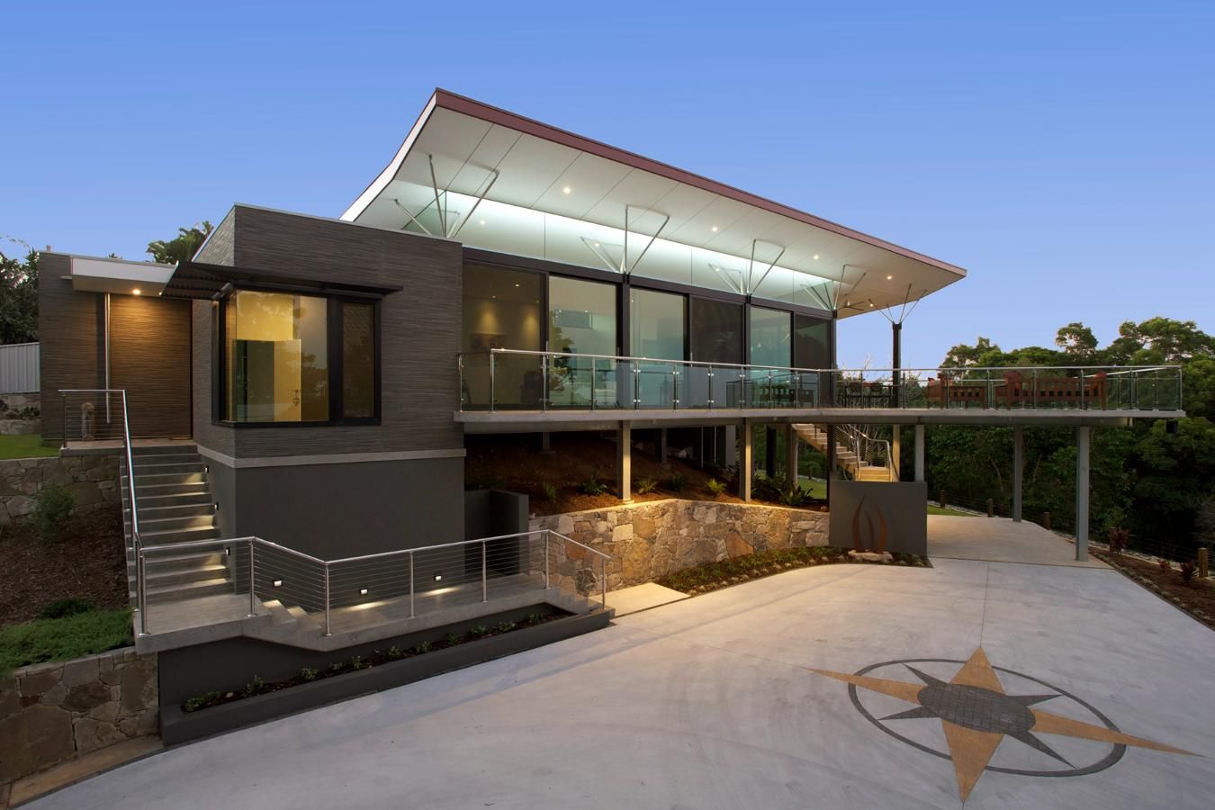 A Large House With a Lot of Windows and Stairs — Sigley Electrical in Mooball, NSW