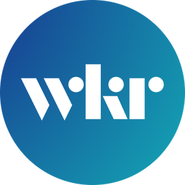 a blue circle with the word wkr on it