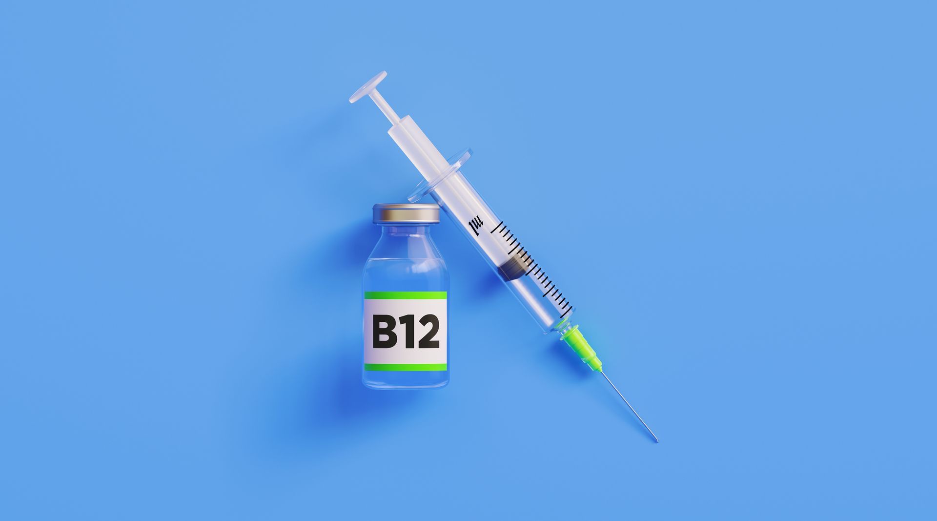 A bottle of b12 and a syringe on a blue background.