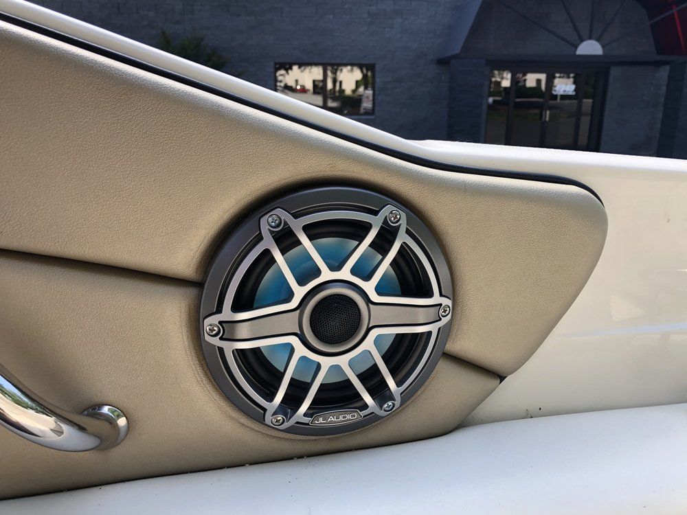 A close up of a speaker on the side of a boat