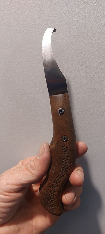 A Horse Farrier Knife With Brown Handle — Shaving Sharp Knives And Tools in Centenary Heights, QLD