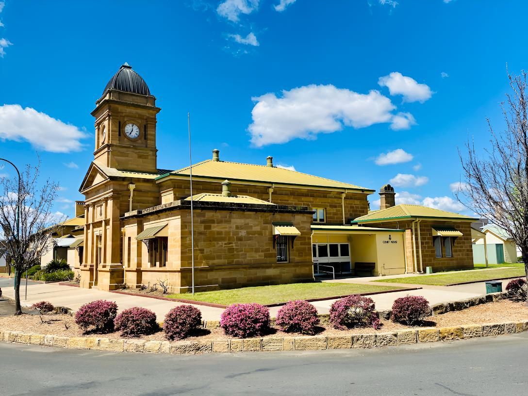 A Large Building With a Clock Tower on Top of It — Shaving Sharp Knives And Tools in Warwick, QLD