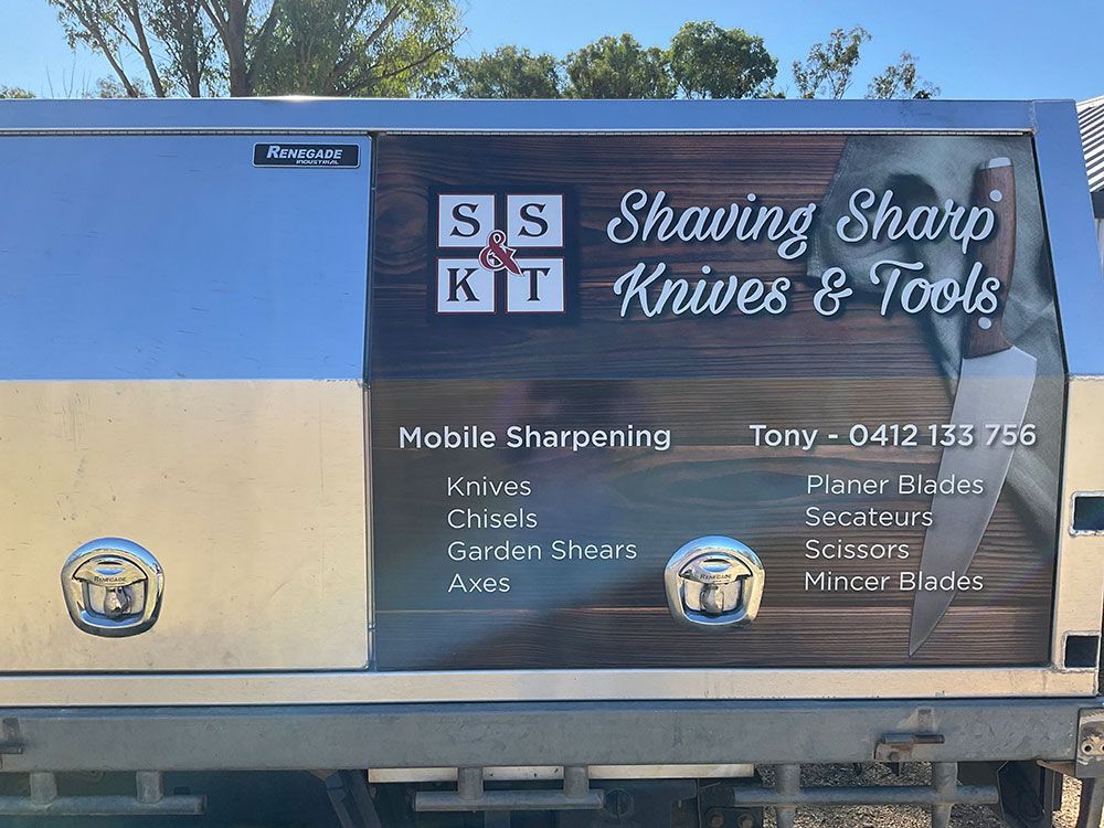 A Truck With a Sign on It That Says Shaving Sharp Knives and Tools — Shaving Sharp Knives And Tools in Centenary Heights, QLD