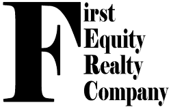 The logo for national realty centers is red , white and blue.