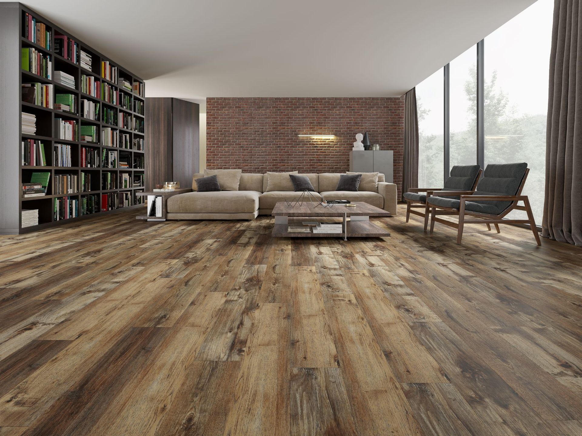 Living room with hardwood floors, sofa, bookshelves, and large windows.