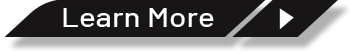 A black sign that says learn more on it