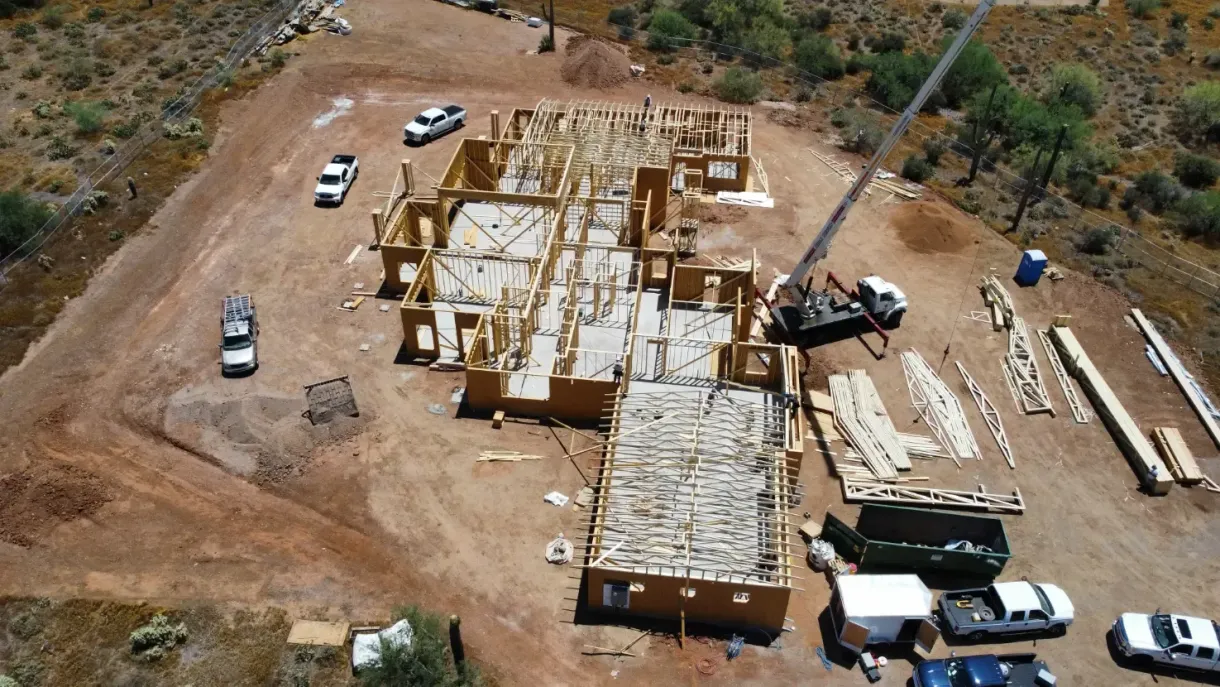 An aerial view of a large building under construction