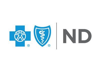 A blue cross and shield with a caduceus on it are on a white background.