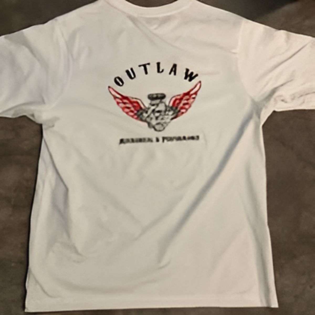 A black t-shirt with a skull on the front — Outlaw Mechanical & Performance In Inverell, NSW
