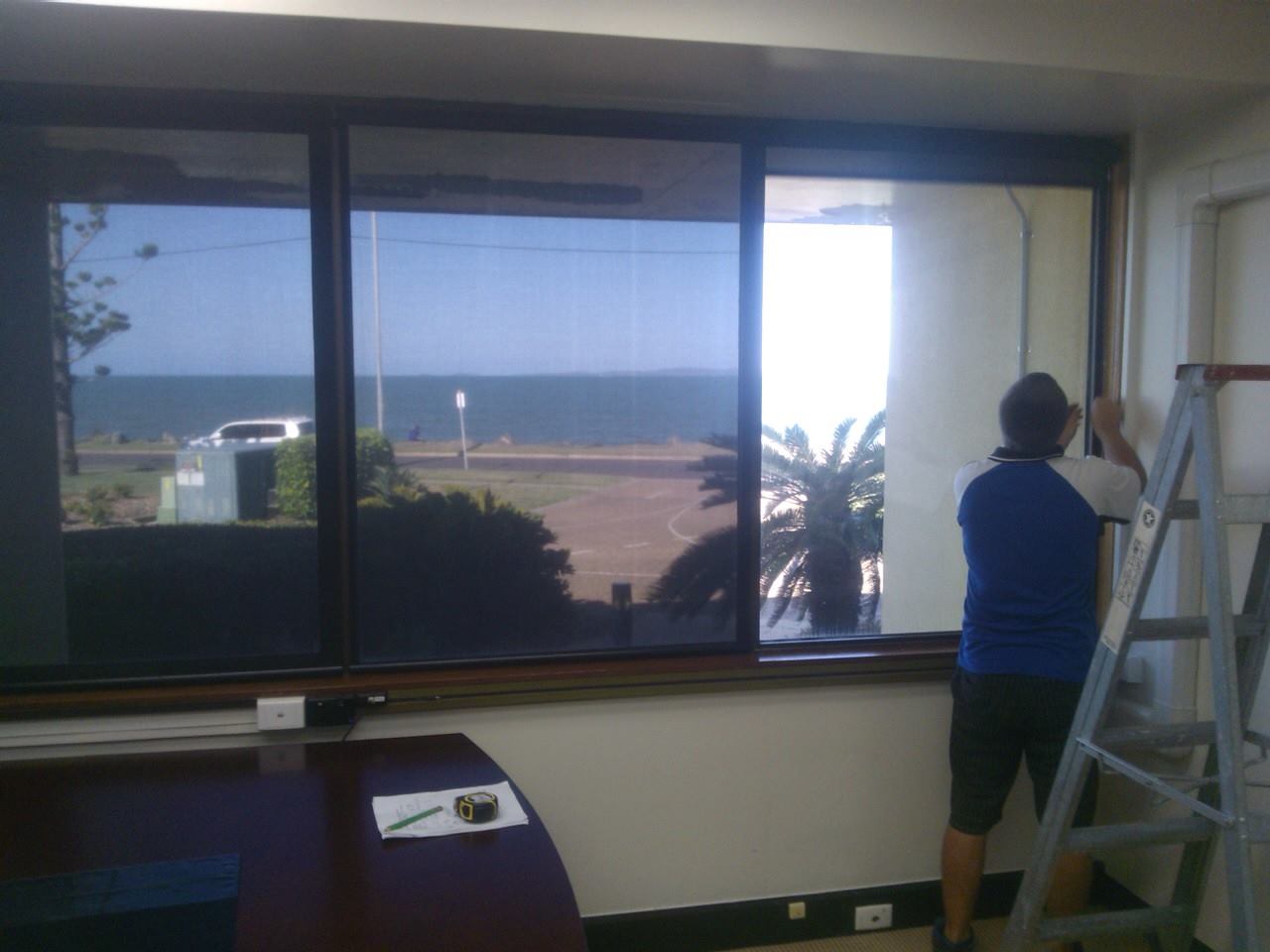 Man Measuring Windows - Capricorn Coast, QLD - Capcoast Glass