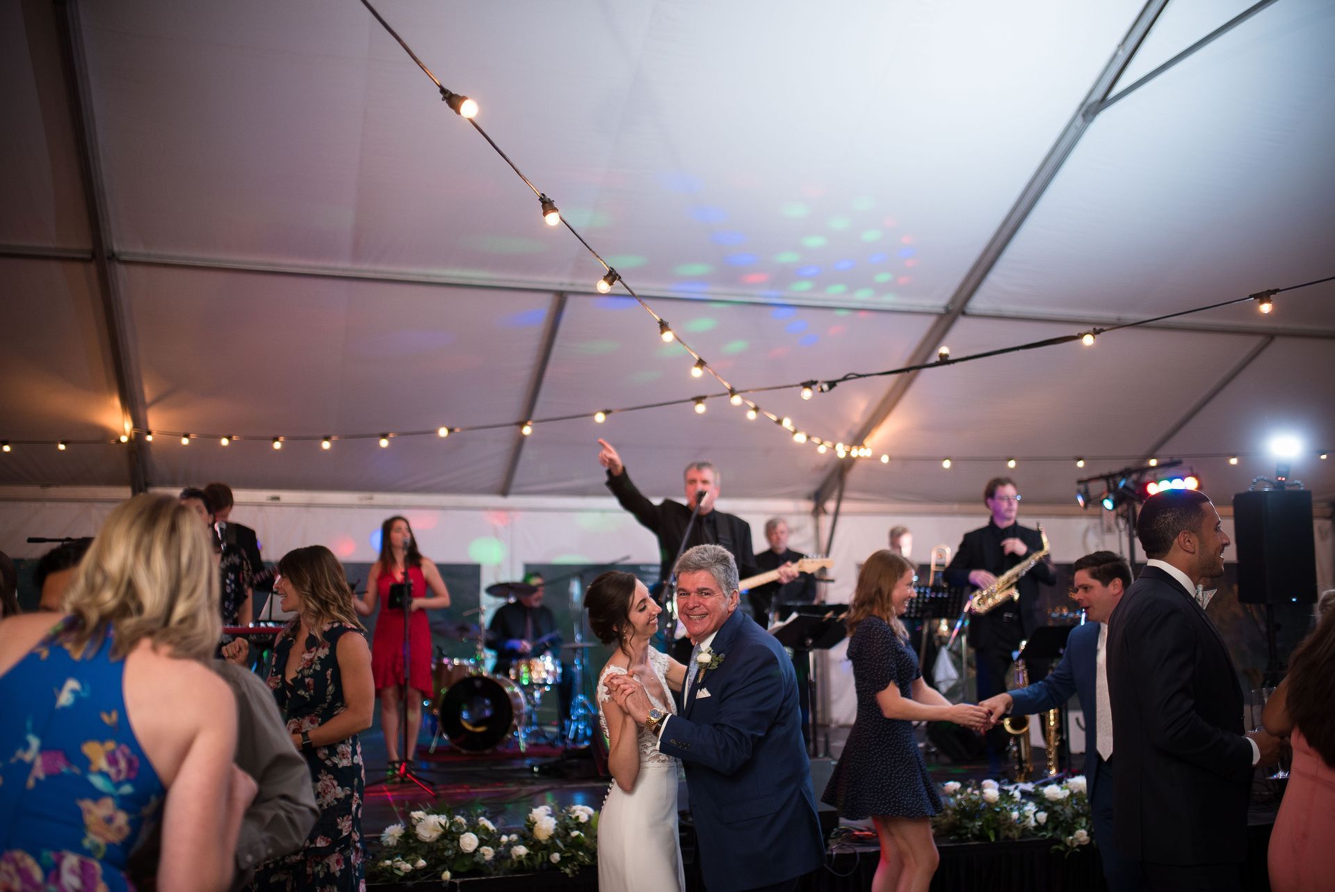 Daughter and father dancing to Jonny Mogambo