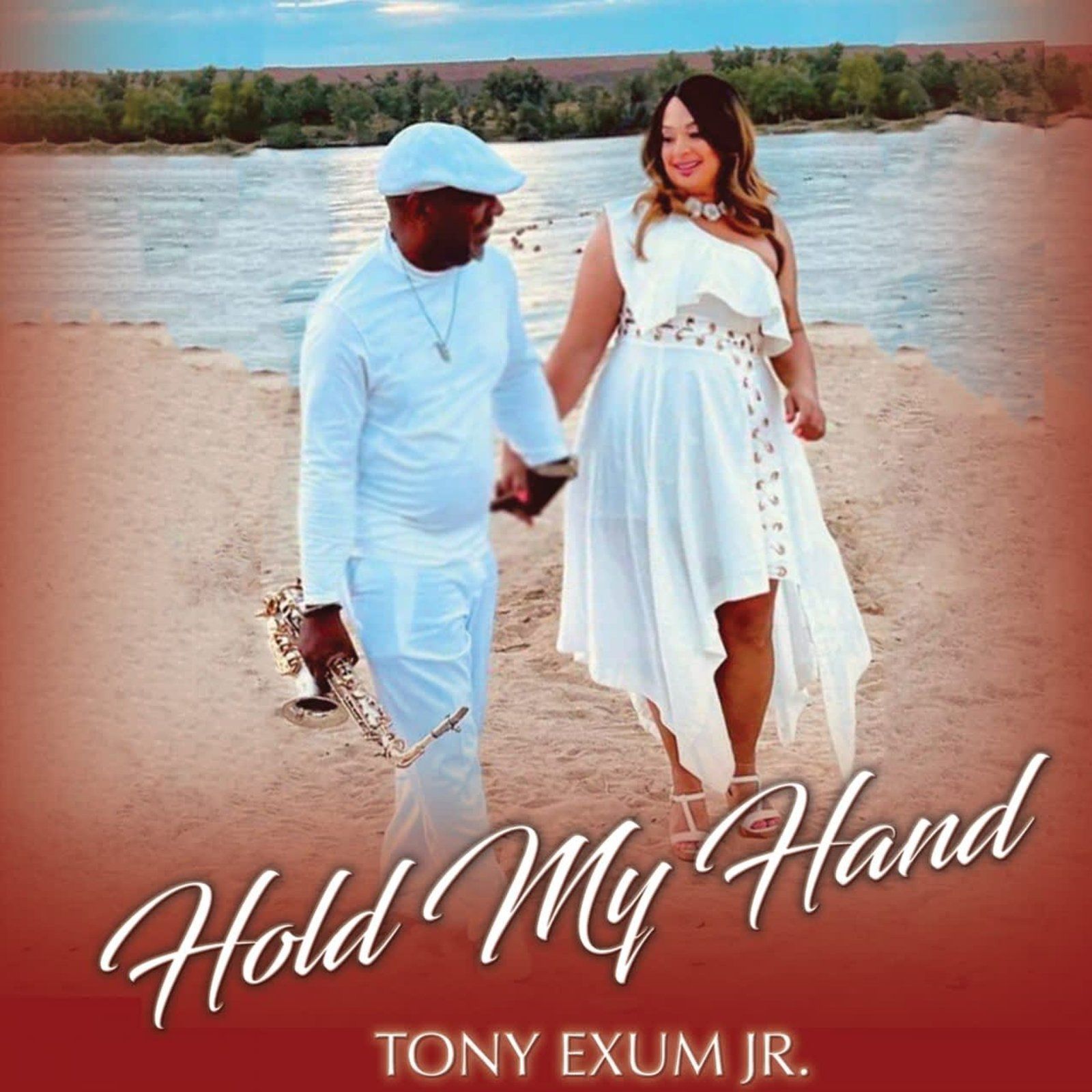 Couple in white outfits holding hands near water; man holds saxophone.