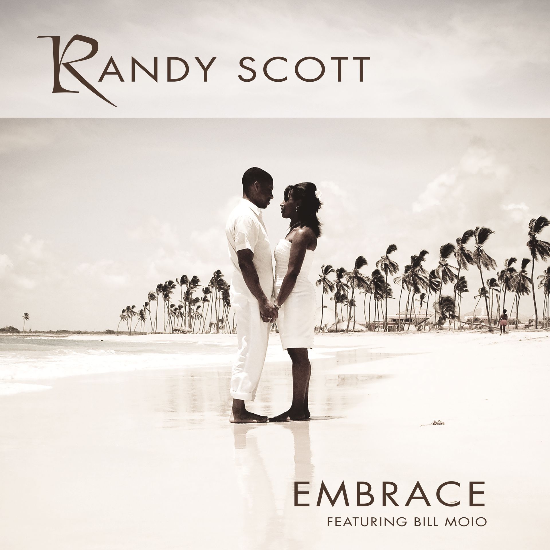 Couple embracing on a beach; Randy Scott album cover, text 