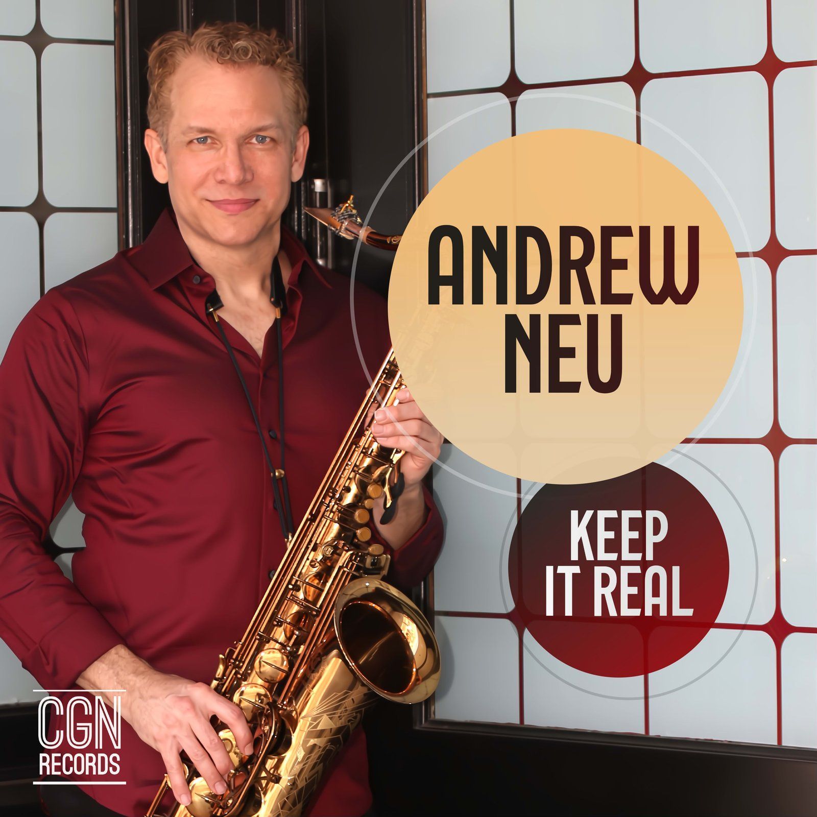 Andrew Neu, holding saxophone, 
