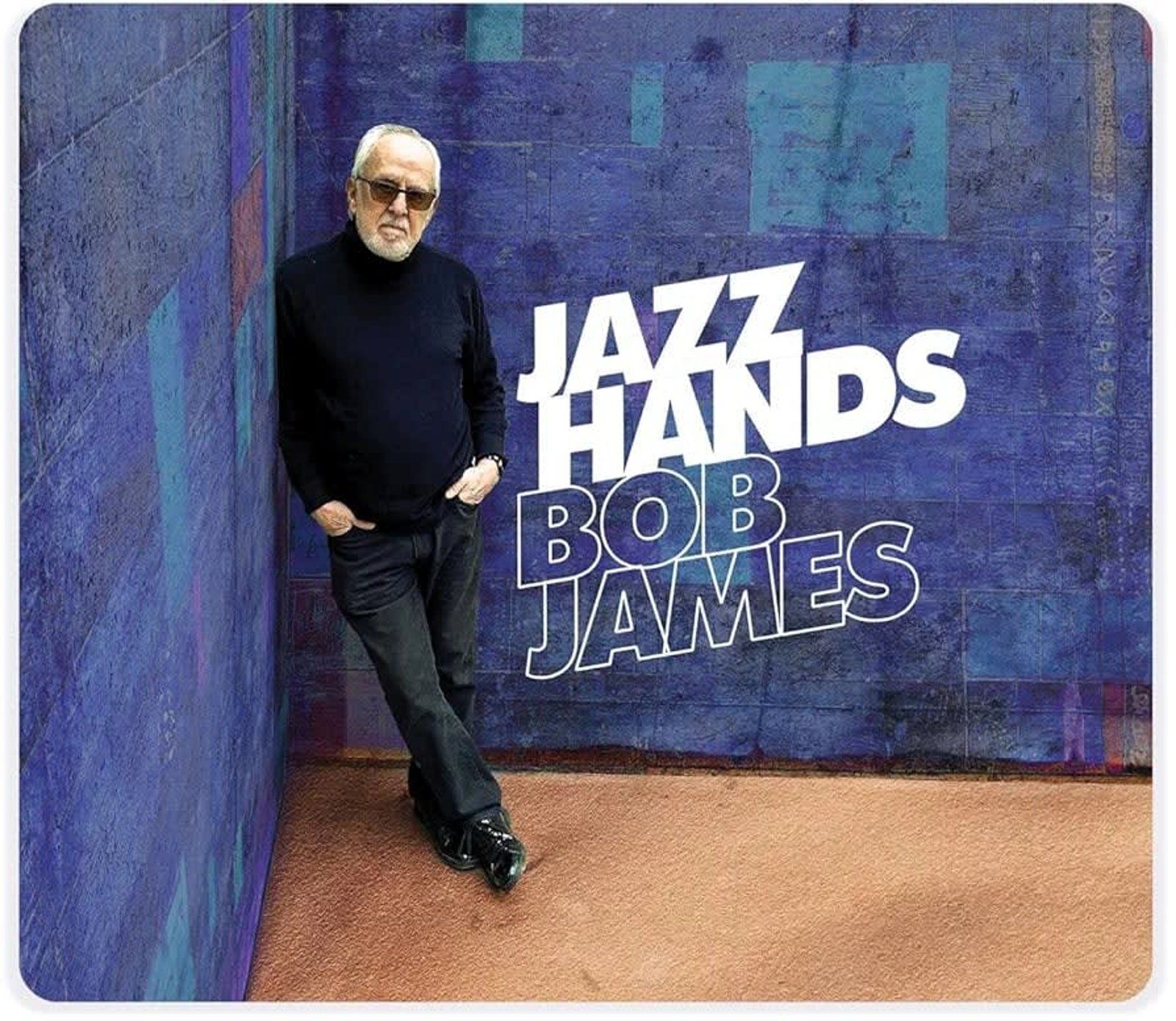 Bob James, leaning against a blue wall, album cover 