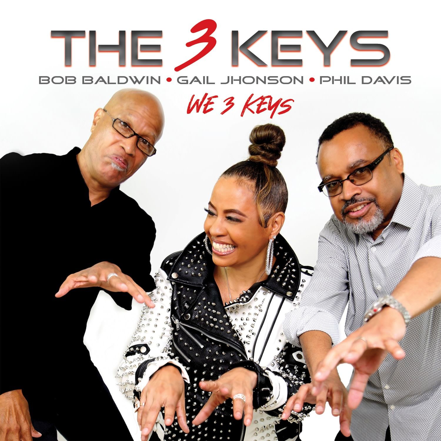 The 3 Keys album cover: Three musicians pointing, smiling. Bold text on top 