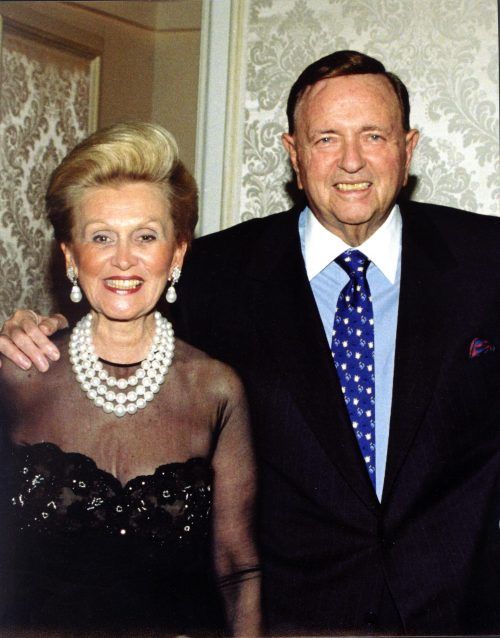 Barbara and Marvin Davis dressed up and smiling in photo together at an event.