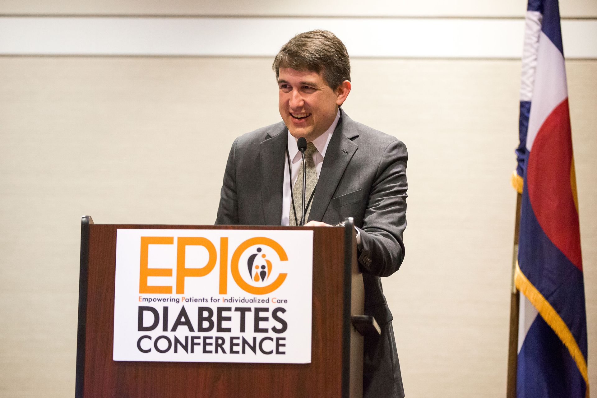 A man is giving a speech at the epic diabetes conference
