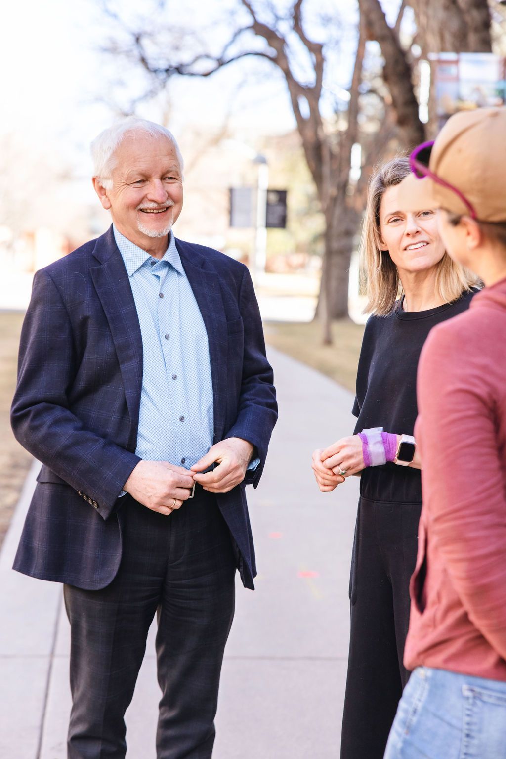BDC Executive Director Dr. Marian Rewers talking with parents.
