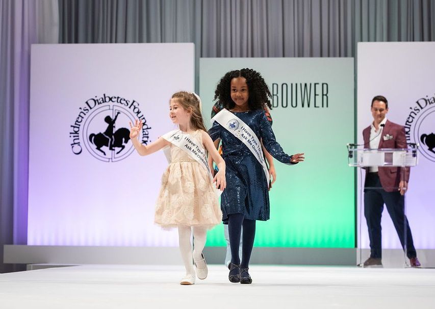 CDF T1D advocates walking down the runway at the Brass Ring Luncheon.