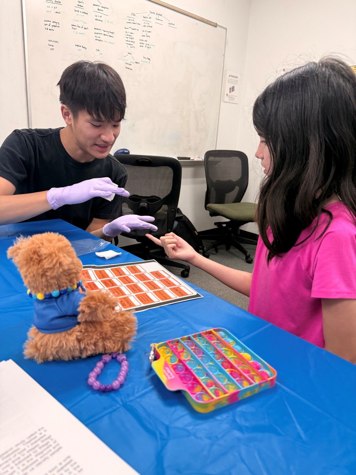 young girl getting tested by nurse for t1d