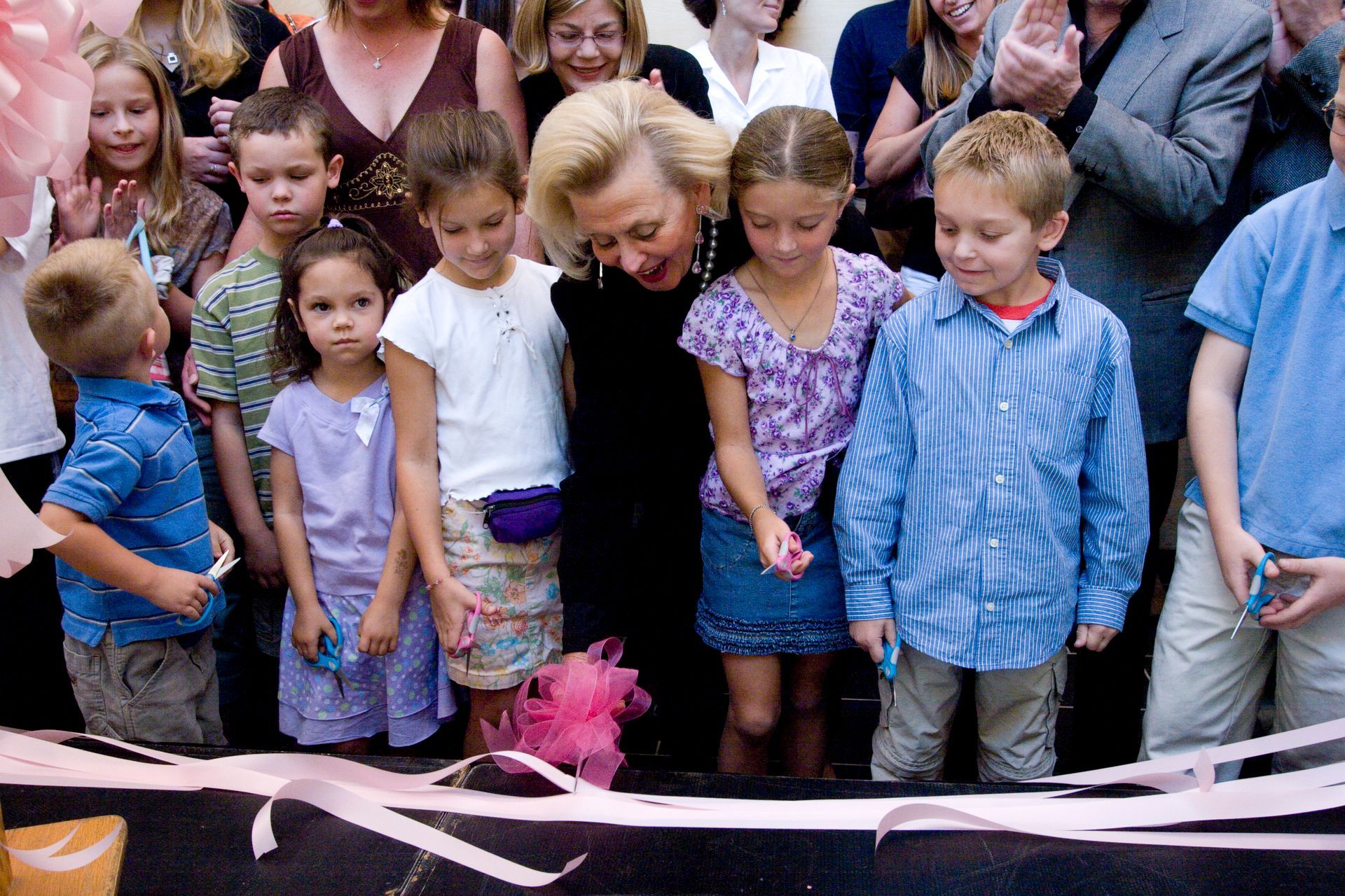 Barbara Davis cutting the ribbon at the opening of the new BDC in 2005.