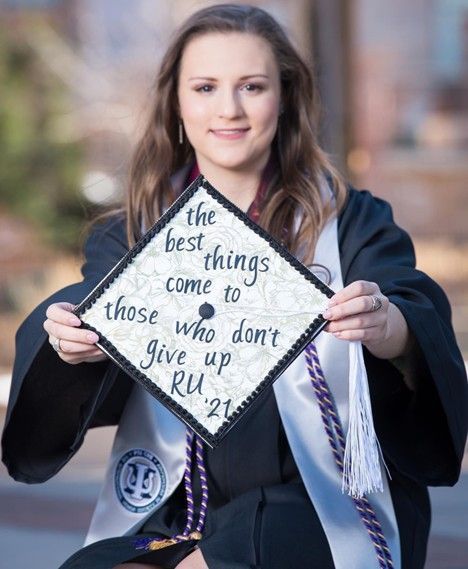 Christina Finch, type 1 diabetic, holding her college grad cap