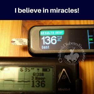 A picture of a blood glucose monitor with the words i believe in miracles