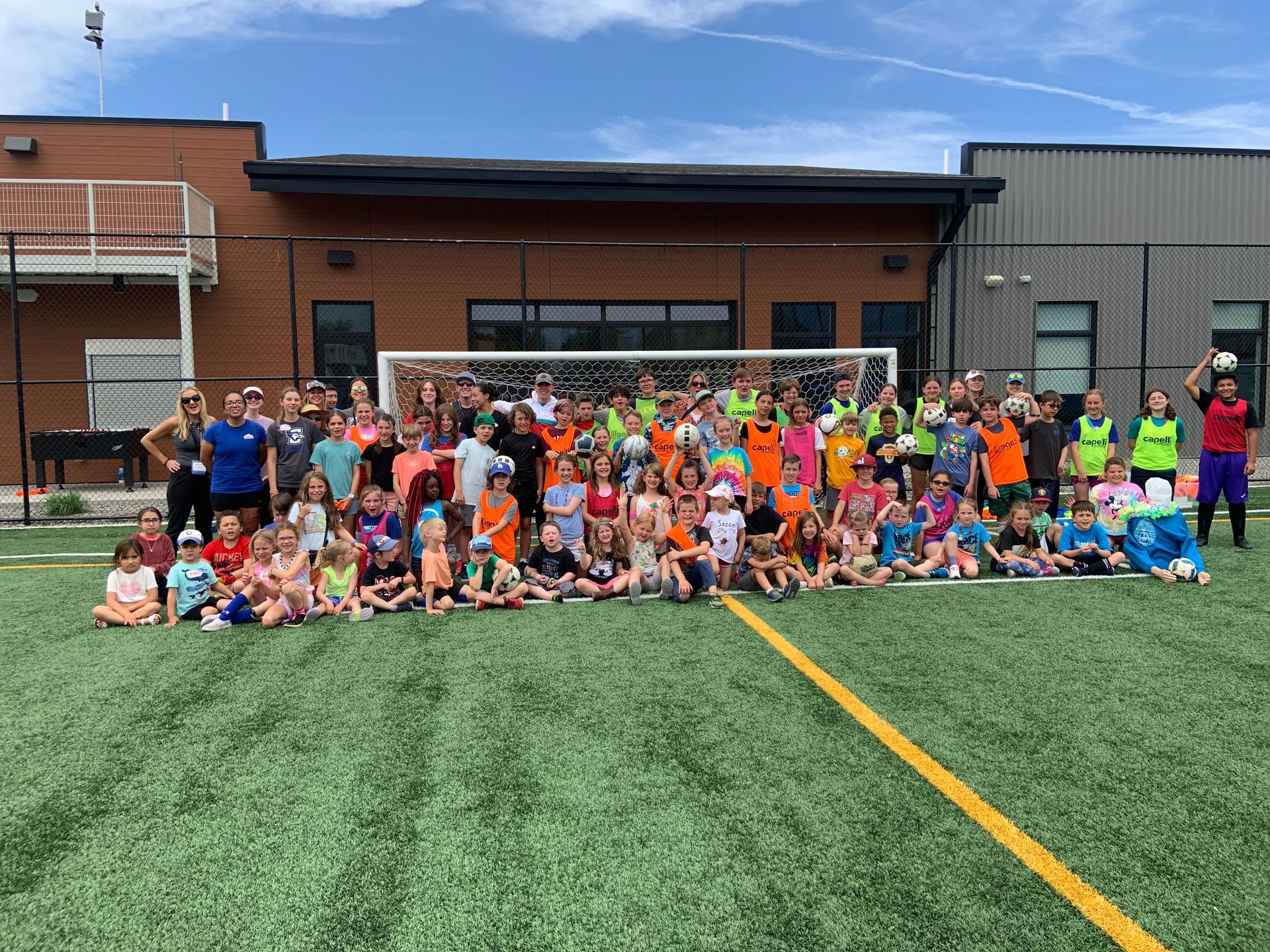 Group photo in front of soccer goal of T1D Strong Day Camp participants.