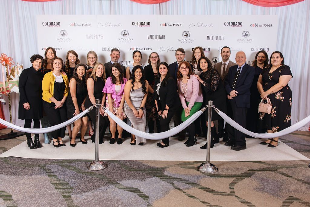 Staff from the Barbara Davis Center for Diabetes pose at the Brass Ring Luncheon and Fashion Show.