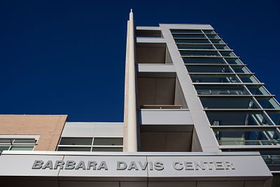 View from ground-up of the front of the Barbara Davis Center building.