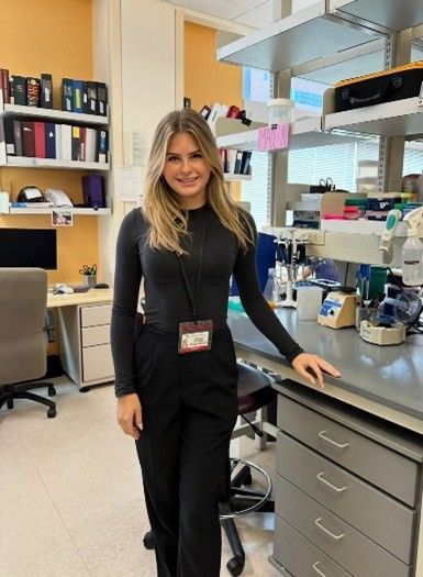 Author and type 1 diabetic Madeline in a research lab