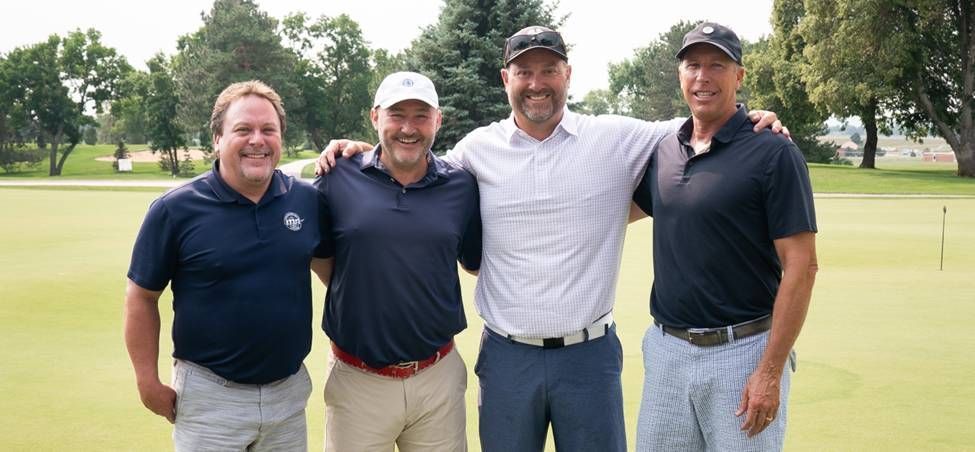 Tournament chairmen Todd Schieck, Michael McDonald, Joe Smolen, and Dan Fuller.