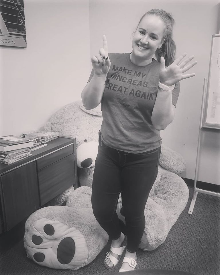 A woman wearing a shirt that says make my pancreas great again