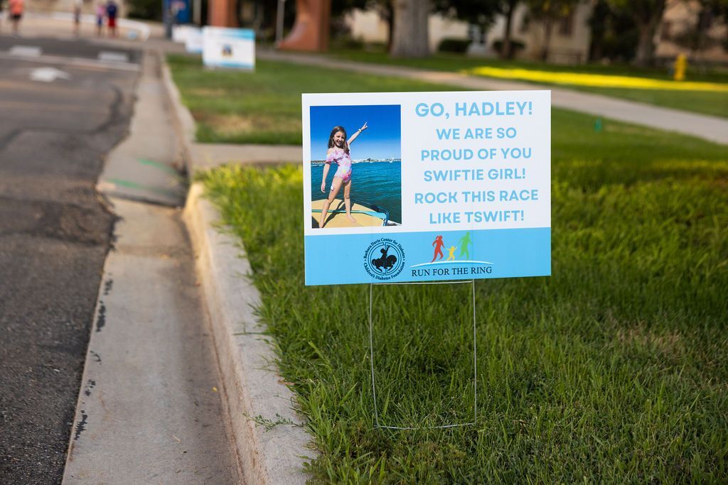 Honorarium yard sign placed along the race route.